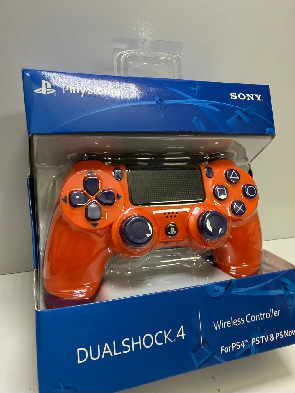 Sony DualShock 4 Wireless Controller - Orange with Dark Blue Buttons